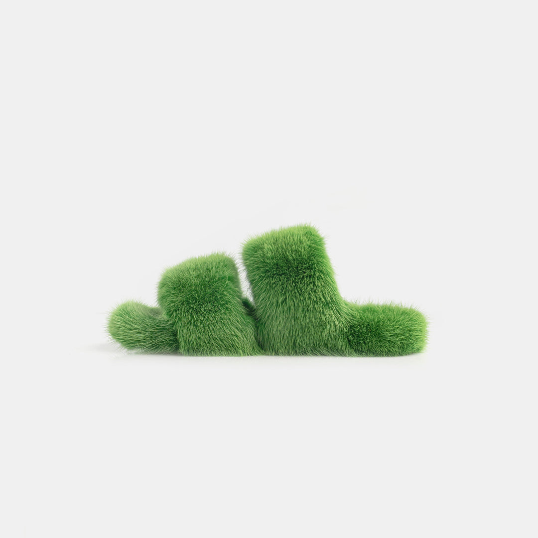 Morbide pantofole da donna verde smeraldo in visone, offrono comfort supremo per il relax a casa.