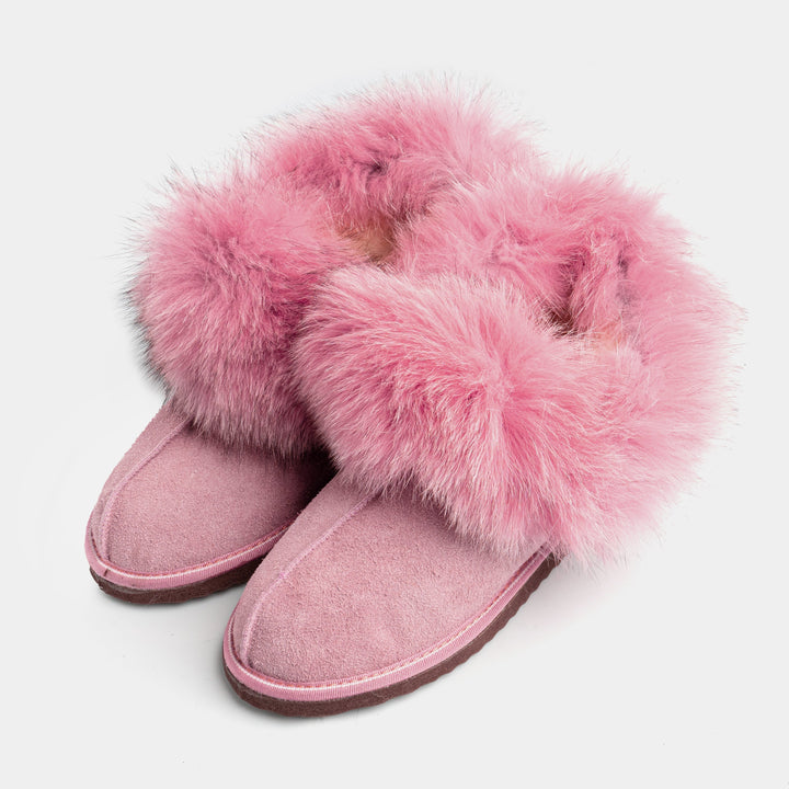 Stivaletti donna rosa in pelle scamosciata, foderati in calda pelliccia di volpe, perfetti per l'inverno elegante.