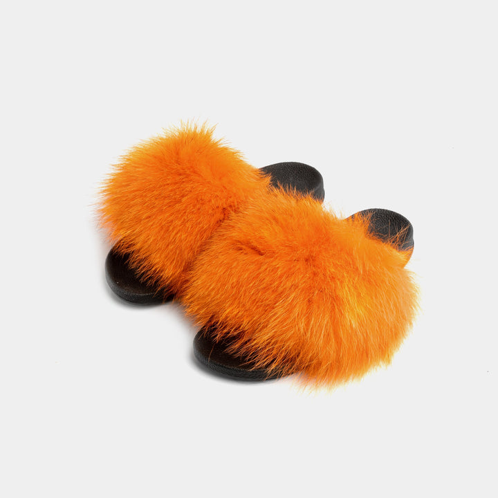 Pantofole donna arancioni in pelliccia di volpe, morbide e calde per comfort e relax in casa.