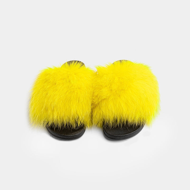 Pantofole gialle donna in soffice pelliccia di volpe, un tocco di colore e comfort elegante per la casa.
