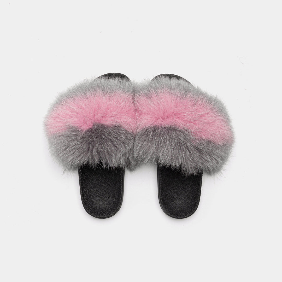 Pantofole da donna calde e avvolgenti in pelliccia di volpe grigia e rosa per momenti di puro relax in casa.