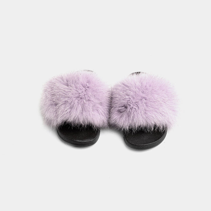 Eleganti pantofole da donna lilla, con soffice pelliccia di volpe per un'esperienza di lusso e comfort a casa.