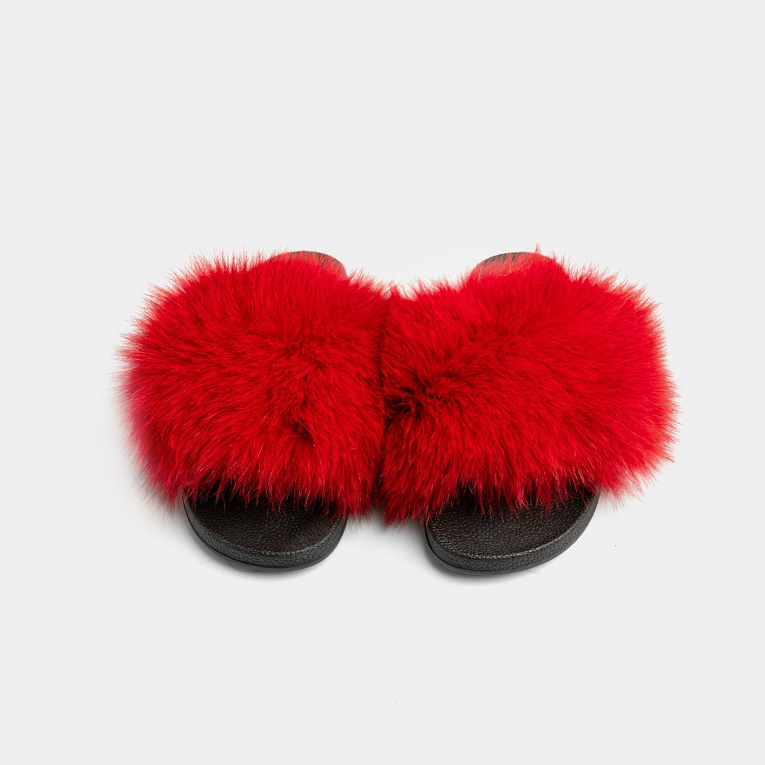 Pantofole rosse da donna con soffice pelliccia di volpe, eleganti e comode per le serate invernali.