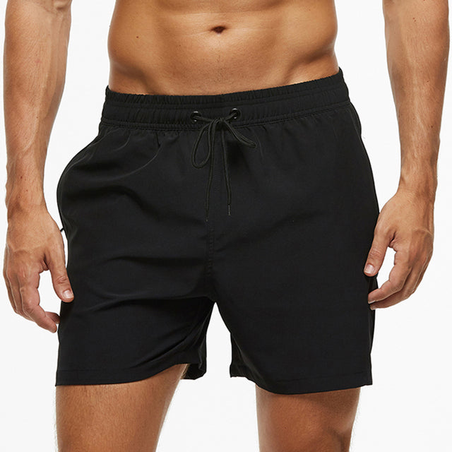 Pantaloncini sportivi uomo neri per allenamento e corsa, con tessuto ad asciugatura rapida, ideali per l'estate.