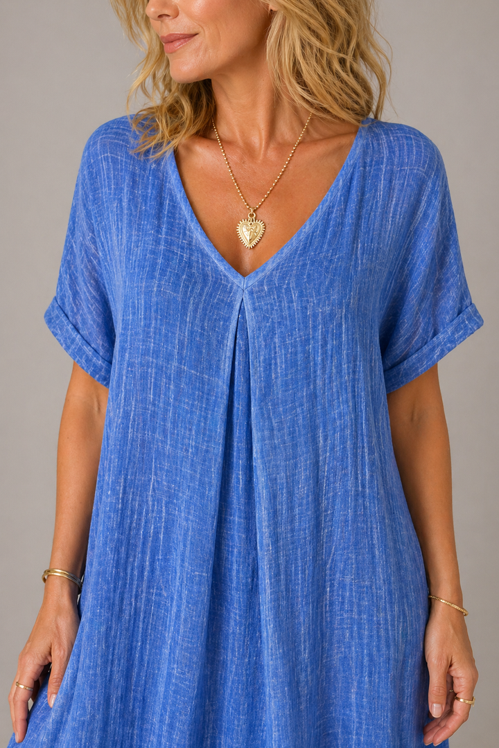 Abito casual estivo da donna blu con scollo a V, tessuto fluido e confortevole per il tempo libero.