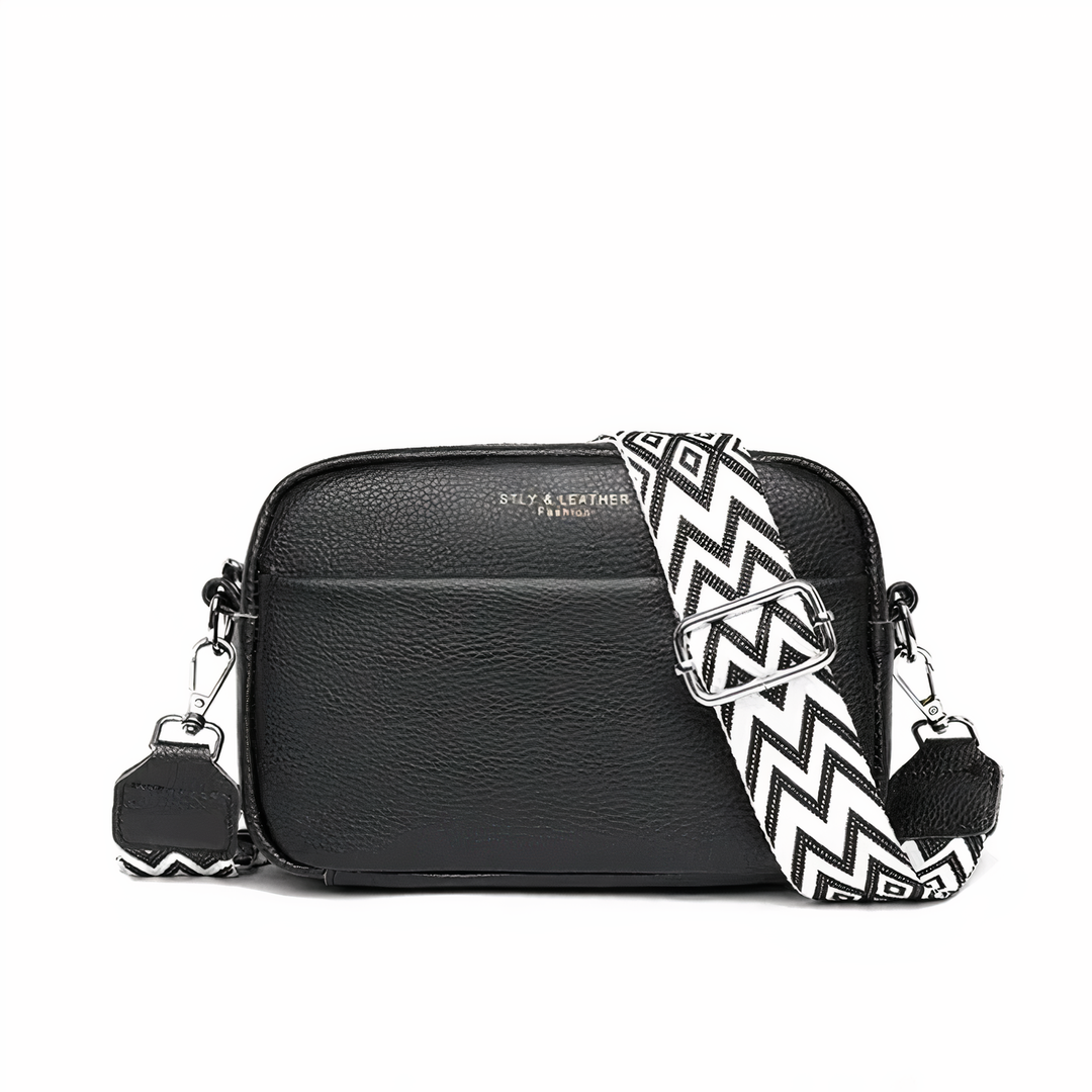 Elegante borsa a tracolla da donna in vera pelle, versatile per look casual o chic.