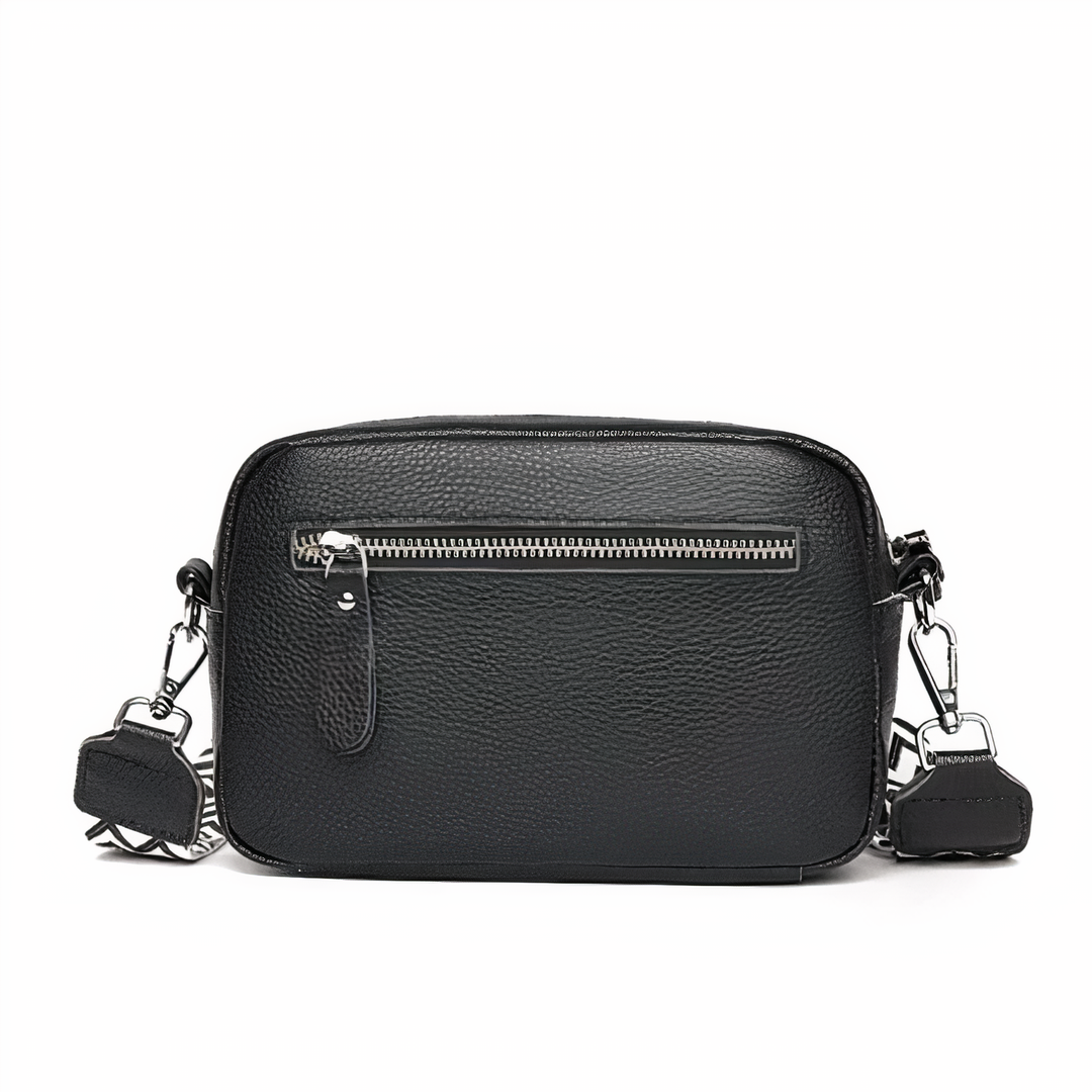 Borsa a tracolla da donna in pelle blu, accessorio moda sofisticato per ogni outfit.
