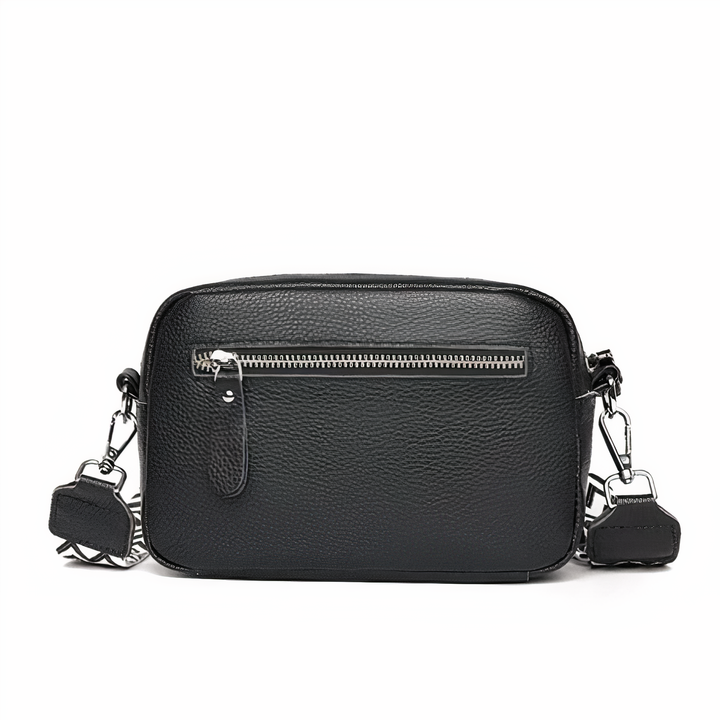 Borsa a tracolla da donna in pelle blu, accessorio moda sofisticato per ogni outfit.
