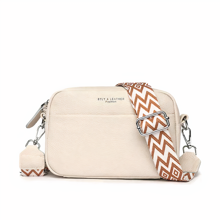 Borsa tracolla da donna in pelle beige, casual e pratica per il giorno, ideale per ogni stile.