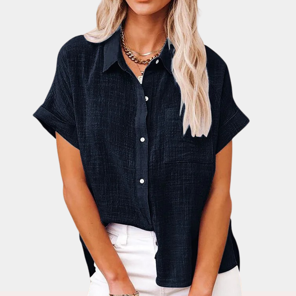 Camicia elegante donna con bottoni, ideale per look versatile, ufficio o casual primavera/autunno.