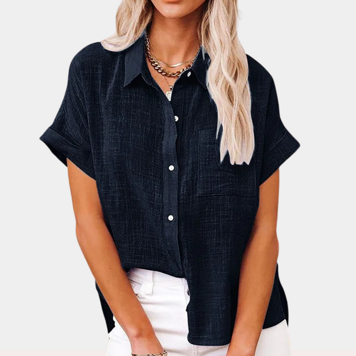 Camicia elegante donna con bottoni, ideale per look versatile, ufficio o casual primavera/autunno.