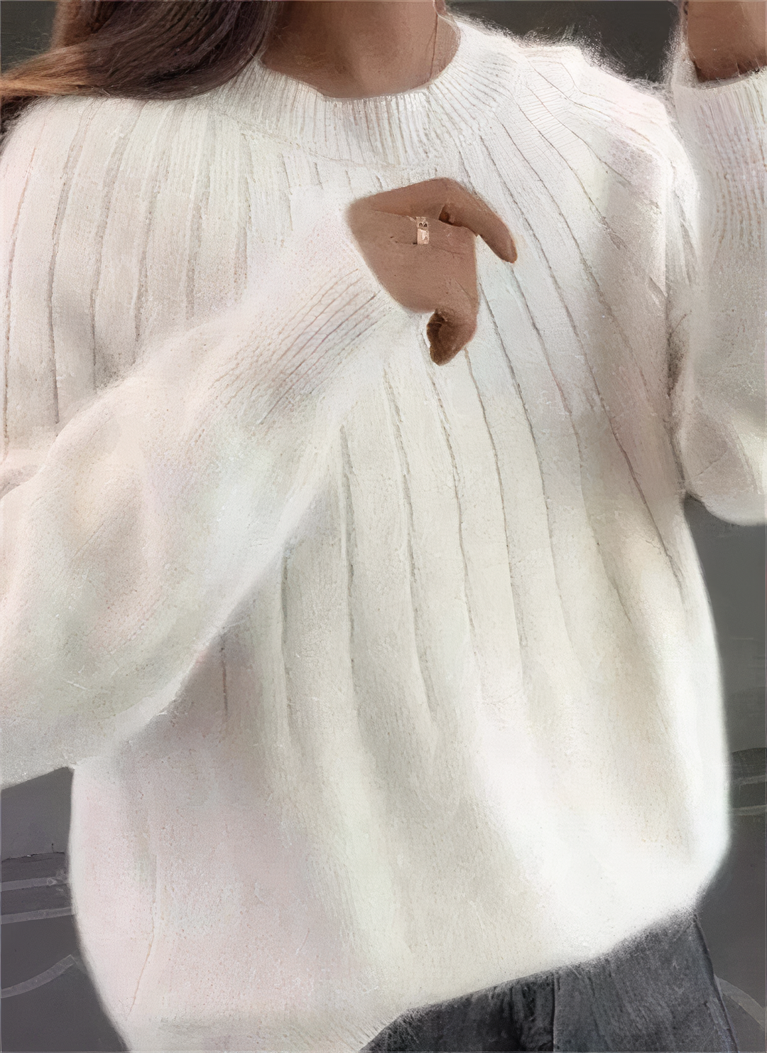 Dettaglio texture maglione donna girocollo in maglia morbida. Pullover invernale elegante e confortevole.