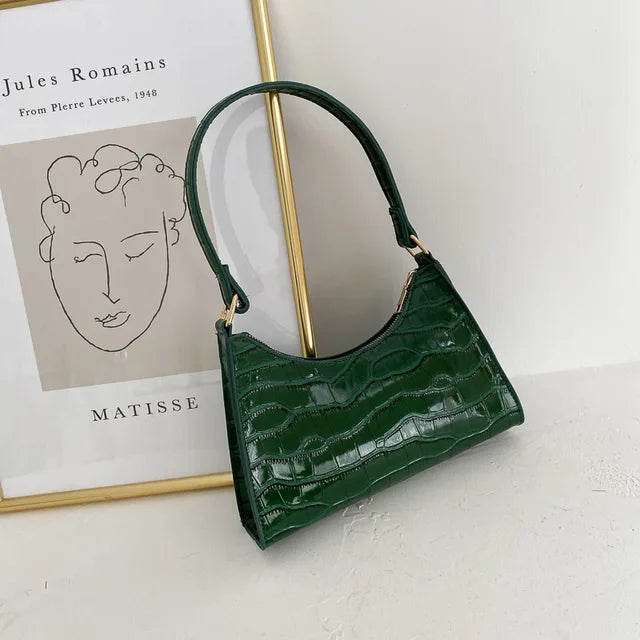 Borsa retrò donna, tracolla comoda. Un accessorio moda must-have per la città.