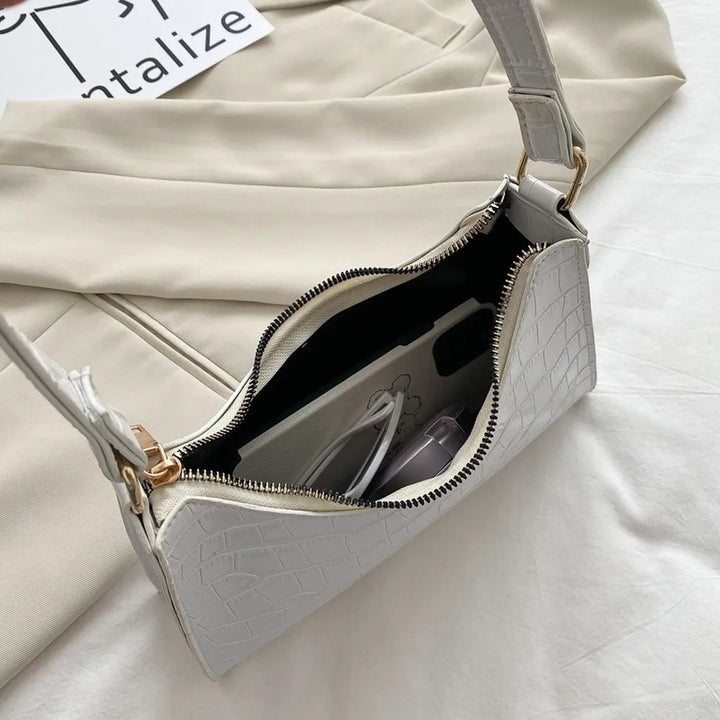 Borsa retrò donna a tracolla, compagna perfetta per la vita quotidiana. Piccola e pratica.