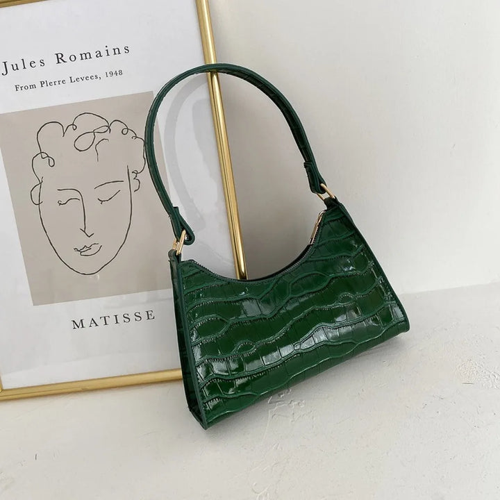 Elegante borsa a tracolla donna stile retrò. Accessorio moda versatile e chic.