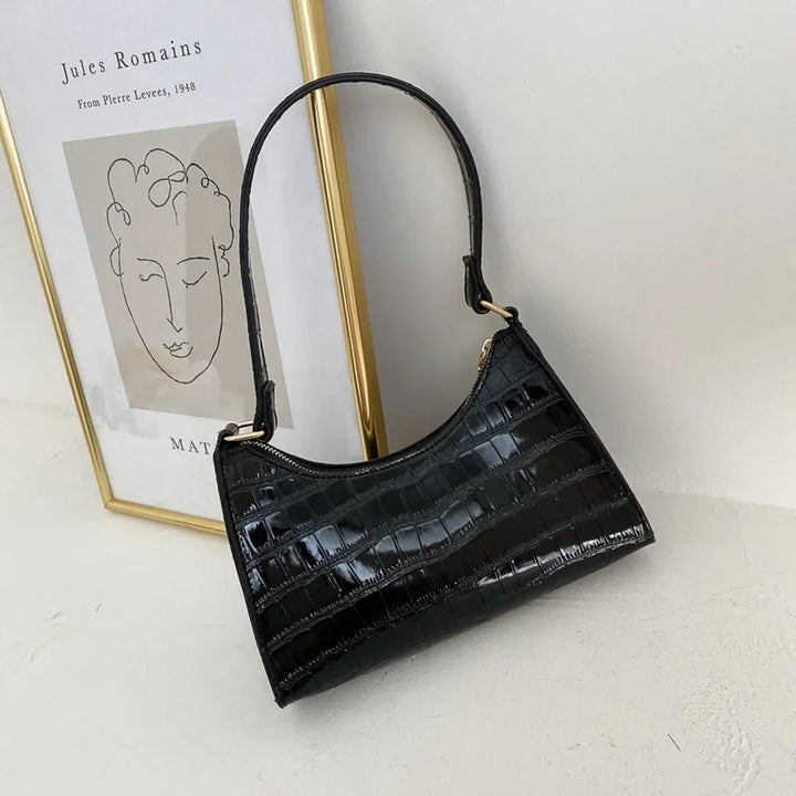 Borsa donna stile retrò, comoda e versatile per casual look. Ideale per viaggio.