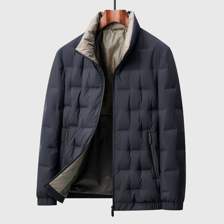 Giacca uomo invernale calda e trapuntata, con collo alto. Perfetta giacca puffer antivento per il massimo comfort.