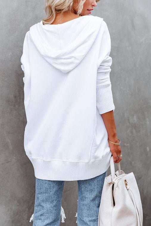 Felpa donna oversize in stile rilassato, con cappuccio, per comfort e moda autunno inverno.