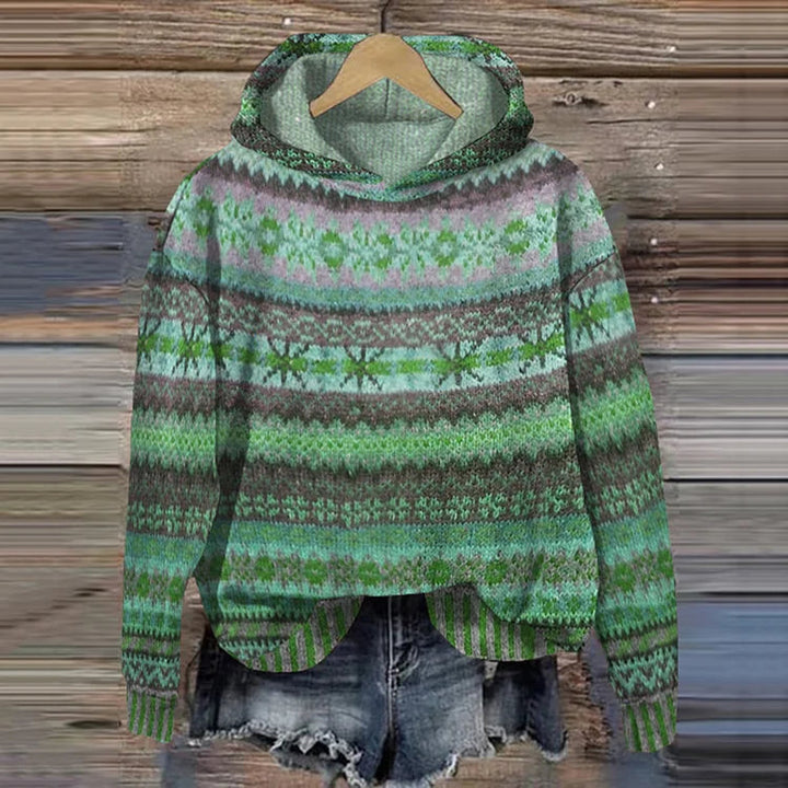 Elegante felpa donna con cappuccio e vivace stampa etnica. Un capo chic per abbigliamento femminile autunno/inverno.