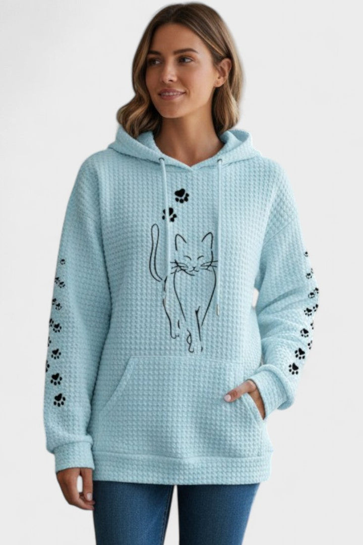 Felpa oversize da donna, colore vivace, con cappuccio e tasca a marsupio. Stile casual e trendy.
