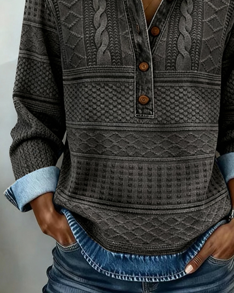 Felpa donna nera con collo a camicia e bottoni, design elegante e maniche lunghe. Perfetta per abbigliamento invernale versatile.