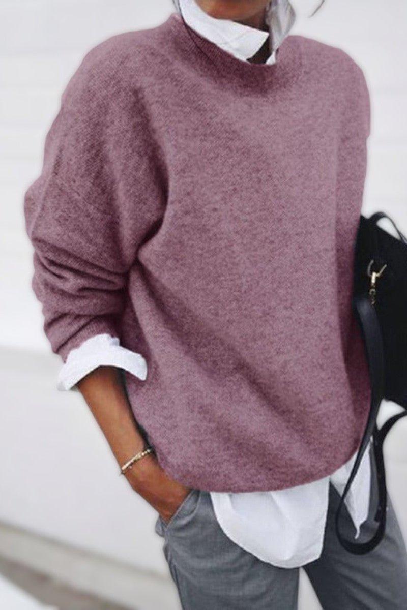 Maglione donna oversize con collo lupetto in colori assortiti, essenziale per un abbigliamento femminile casual e trendy.