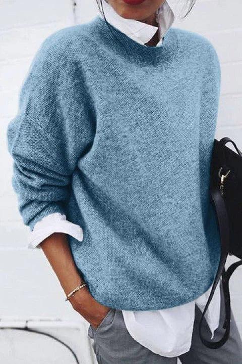 Maglione donna oversize con collo lupetto e maniche lunghe, perfetto per comfort e stile casual invernale.