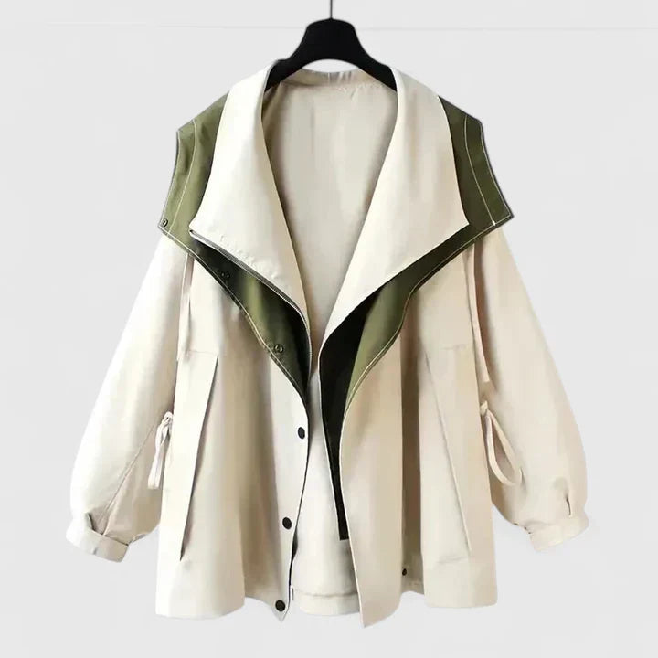 Felpa donna sportiva con cappuccio, effetto due pezzi. Disponibile in verde, bianco, nero per outfit casual.
