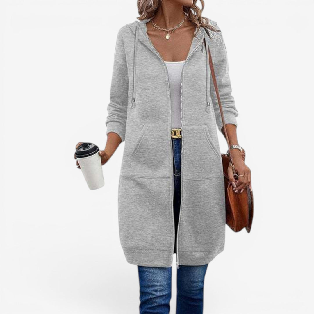 Moderna felpa lunga donna con zip frontale e cappuccio, perfetta per comfort quotidiano.