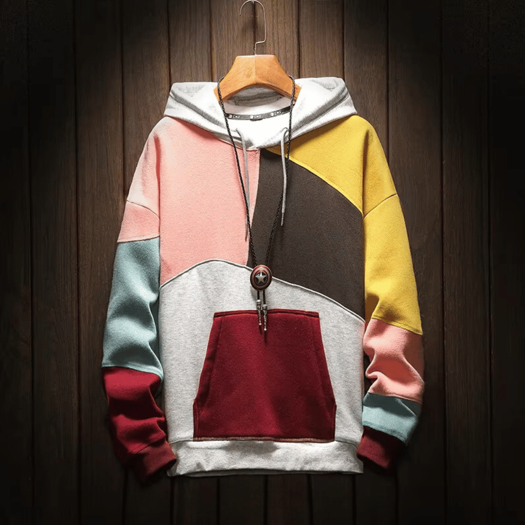 Felpa moderna da uomo con cappuccio e dettagli color block. Perfetta per il comfort autunnale.