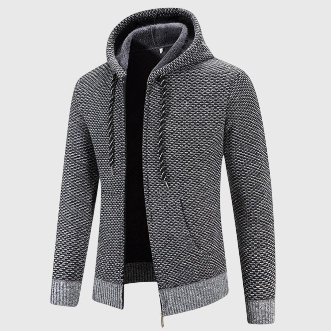 Felpa con cappuccio e zip integrale per uomo. Design confortevole, perfetta per strati autunnali e sportivi.