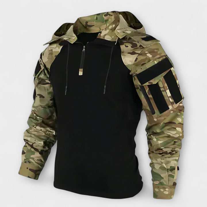 Felpa tattica da uomo con cappuccio, mezza zip e tasche multiple. Ideale per un look casual e funzionale.
