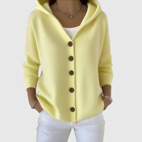 Felpa donna comoda con cappuccio e bottoni frontali, un capo versatile per l'eleganza casual.
