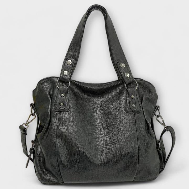 Borsa hobo da donna, design morbido e capiente. Borsa a spalla per la moda quotidiana, stile chic.