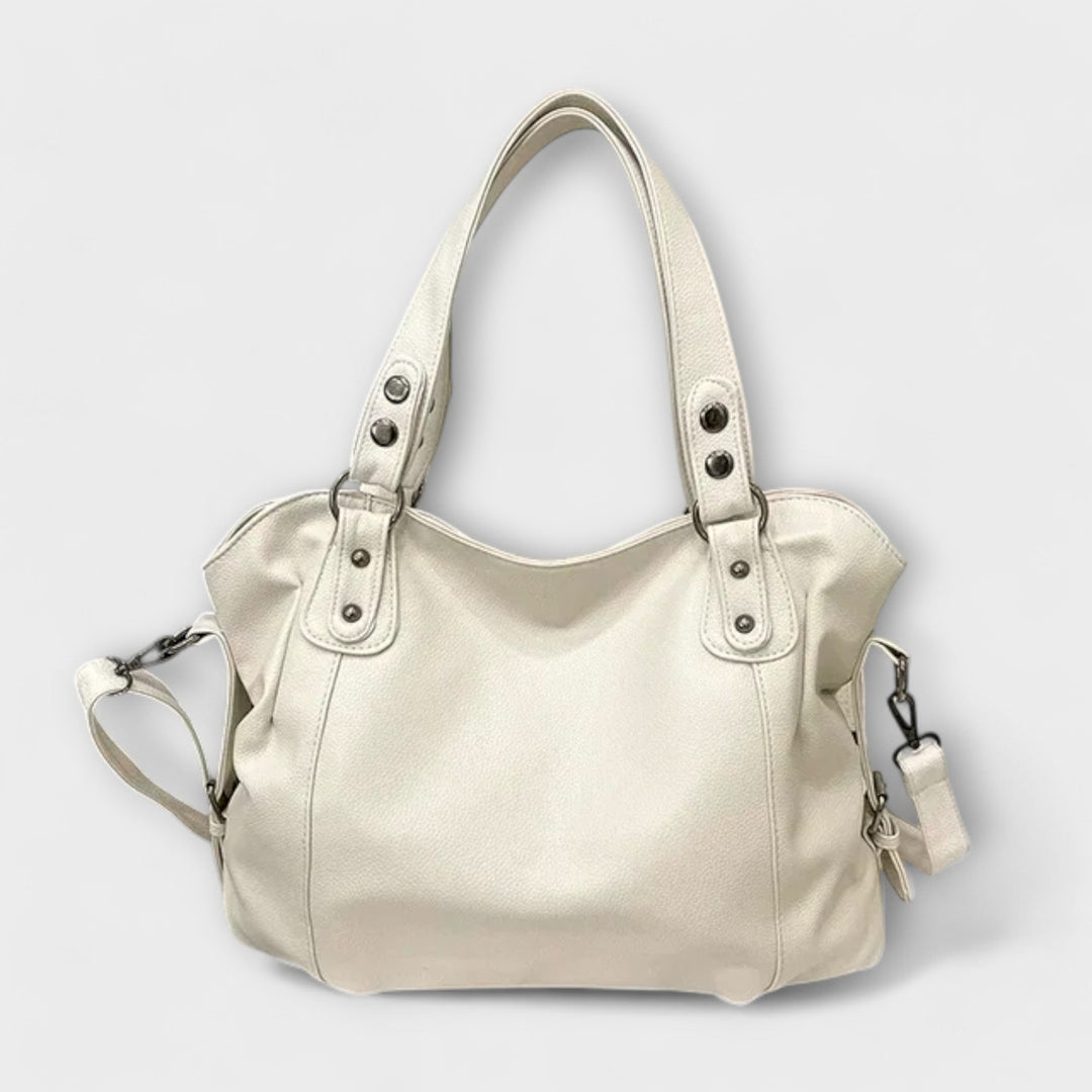 Borsa hobo donna morbida a spalla. Perfetta per l'eleganza quotidiana, accessorio moda chic e comodo.