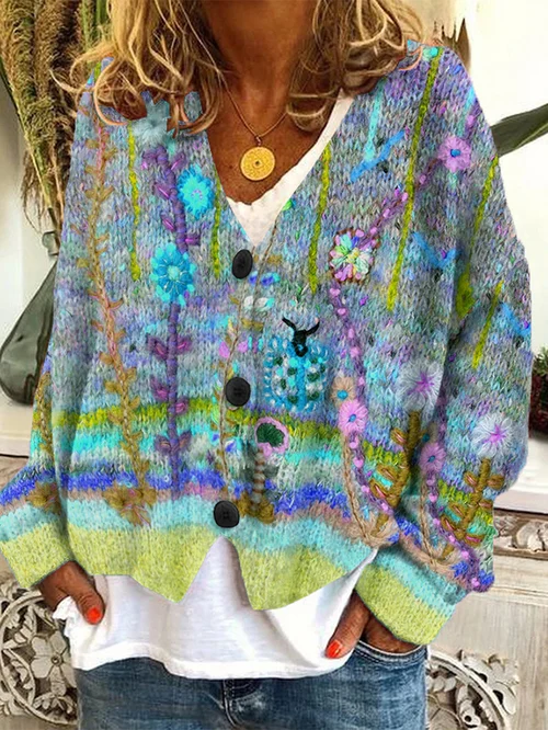Elegante cardigan donna floreale multicolore, con scollo a V e bottoni. Versatile per look di primavera e autunno.