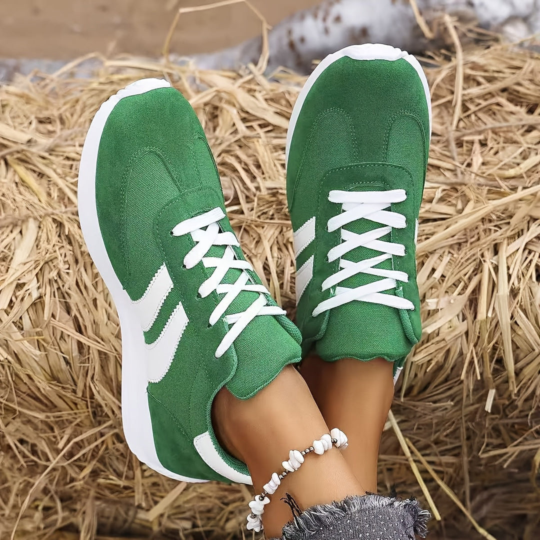 Sneakers ortopediche da donna leggere verde e blu, con suola ammortizzata per massimo comfort e supporto.