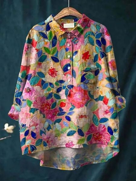 Blusa donna a fiori, ideale per primavera ed estate. Eleganza versatile e comfort duraturo.