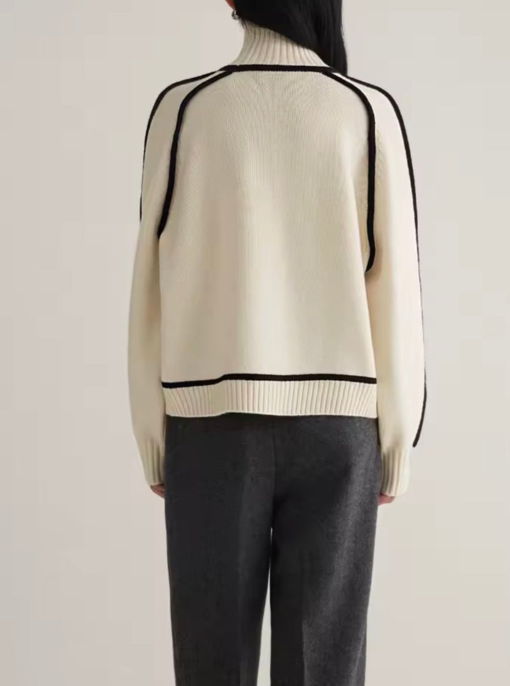 Caldo maglione dolcevita donna color block, versatile per moda inverno. Abbigliamento casual e confortevole.