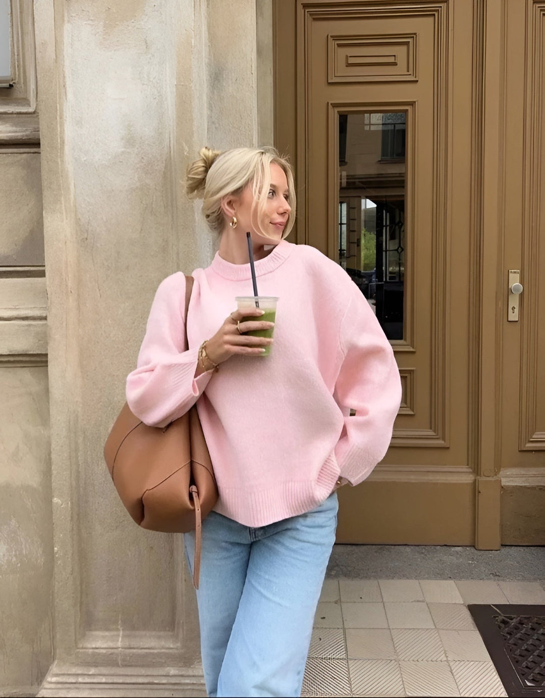 Maglione oversize rosa da donna con scollo rotondo, perfetto per un look casual autunnale.