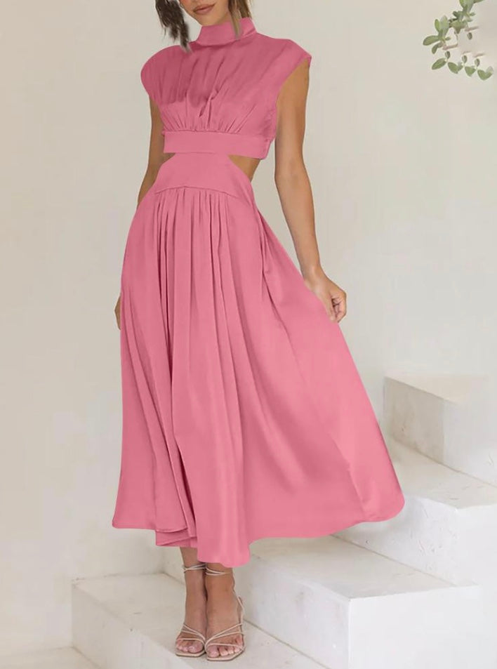 Abito lungo estivo confortevole ma elegante, con dettaglio cut-out. Ideale per la moda donna e versatile.