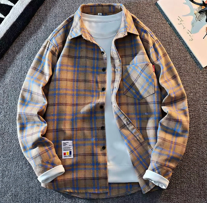 Camicia uomo a quadri, maniche lunghe, in stile casual e versatile, per un comfort leggero e look quotidiano.