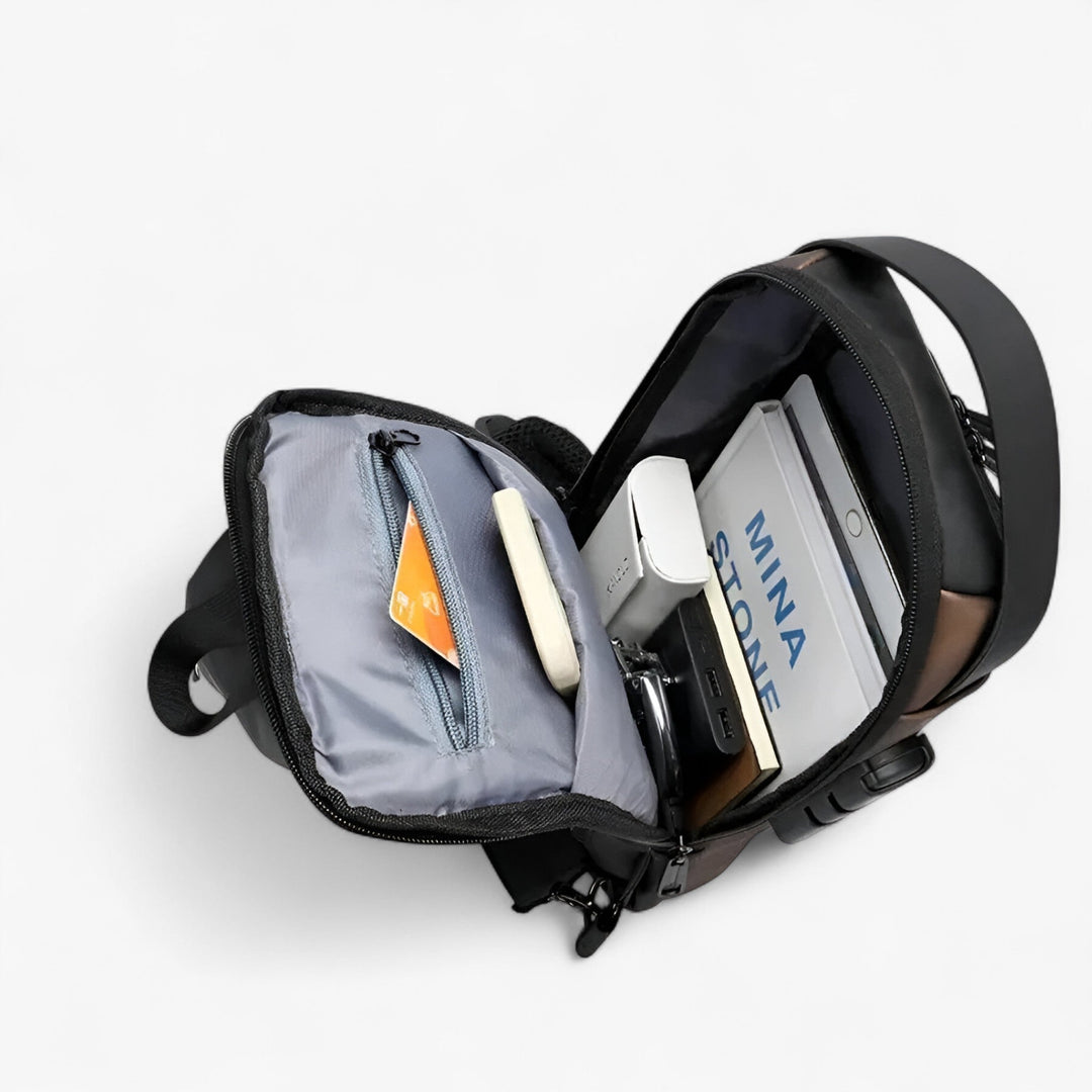 Borsa monospalla antifurto da uomo, ideale per viaggi sicuri. Funzionale e pratica, perfetta per l'uomo moderno.