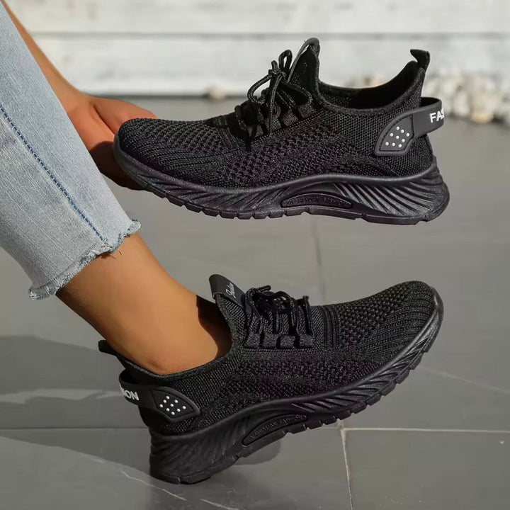 Sneakers donna sportive e comode, con ammortizzazione, perfette per allenamento, running o passeggio.