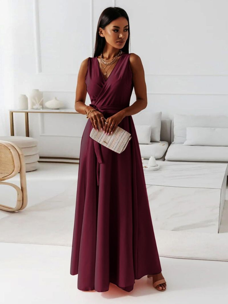 Elegante abito da sera blu navy lungo con scollo a V per donna, ideale per cocktail e serate speciali.