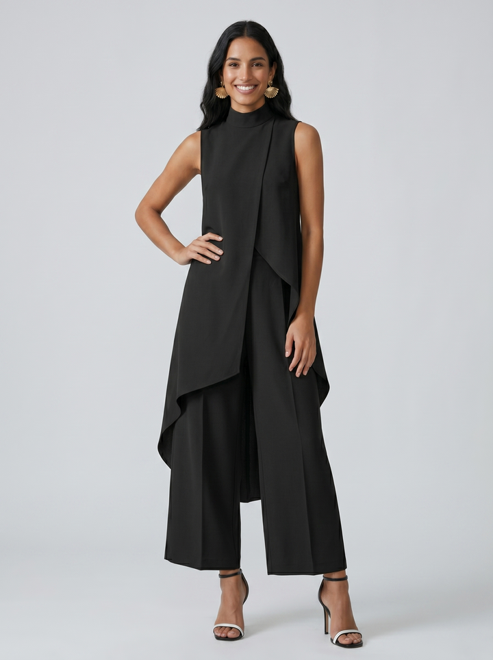 Moda estiva: completo donna total look, top collo alto e pantaloni fluidi per un'eleganza casual.