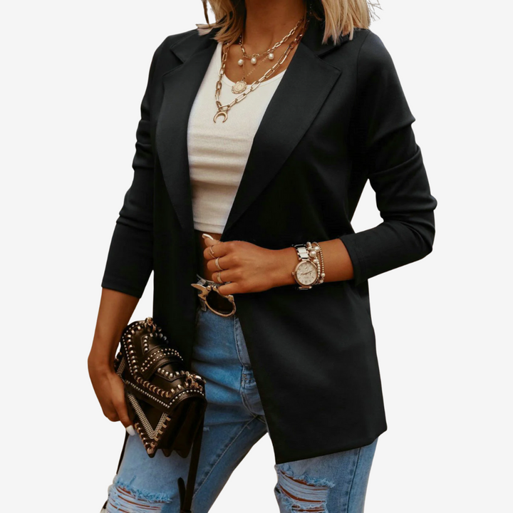 Giacca lunga donna nera elegante con revers, perfetta per ufficio e stile quotidiano, un capospalla versatile.