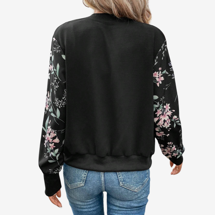 Outfit primaverile: giacca donna bomber floreale, capo versatile per la moda femminile.