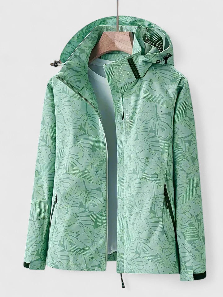 Giacca donna leggera con cappuccio e vivace fantasia tropicale, perfetta per primavera e autunno.