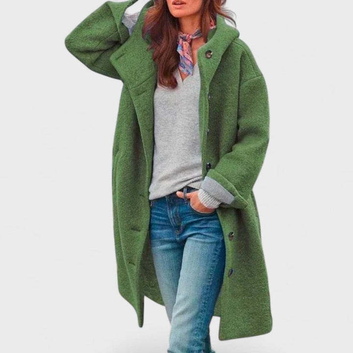 Giacca donna oversize lunga con cappuccio, ideale per autunno e inverno, stile casual e confortevole.